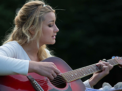 Girl playing guitar