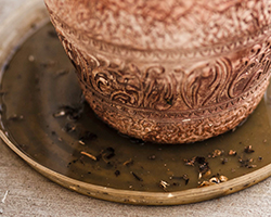 A planting pot tray with water in it