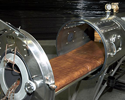 An iron lung, the breathing machine used to help those paralyzed by polio.