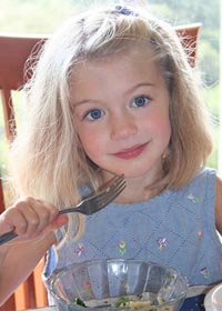 Girl eating healthy food.