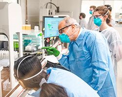 Joshua LaBaer working in a research laboratory in Biodesign Institute at ASU