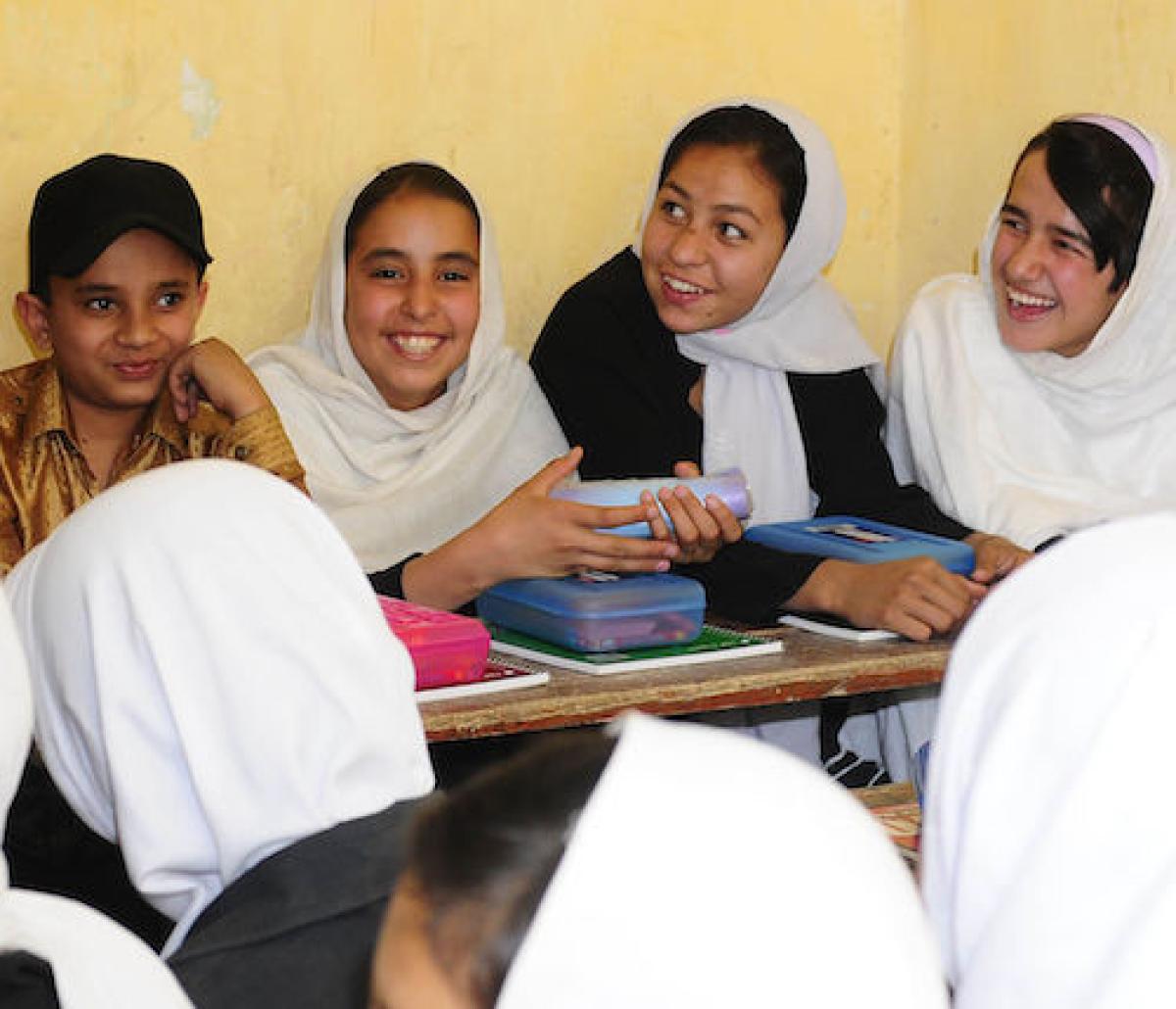 Students laughing in classroom