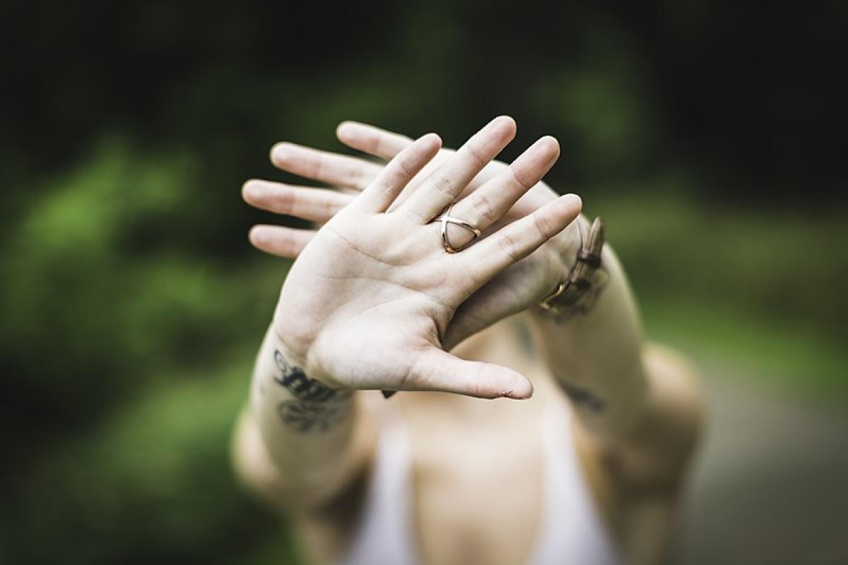 Hands hiding face - image by Drew Hays