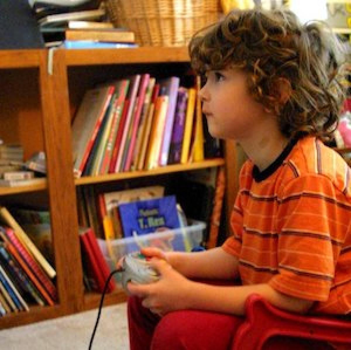 A young child playing video games