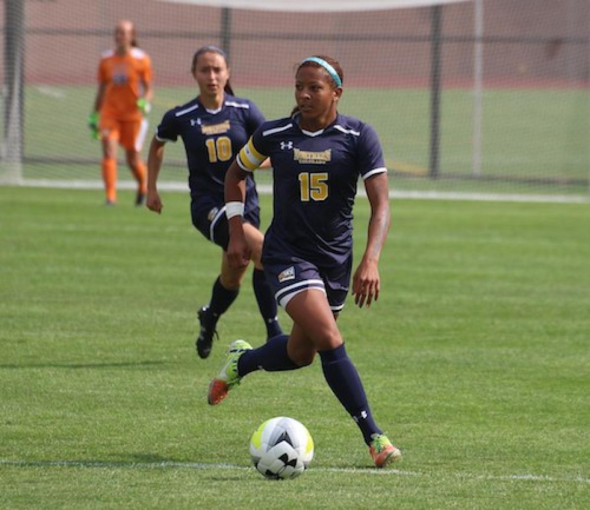 women playing soccer