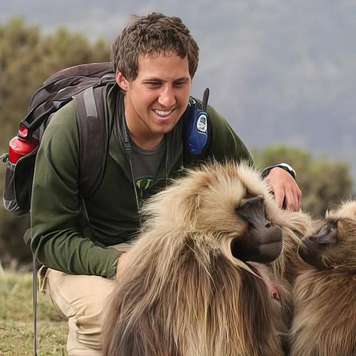 Noah Snyder-Mackler with Gelada monkeys.